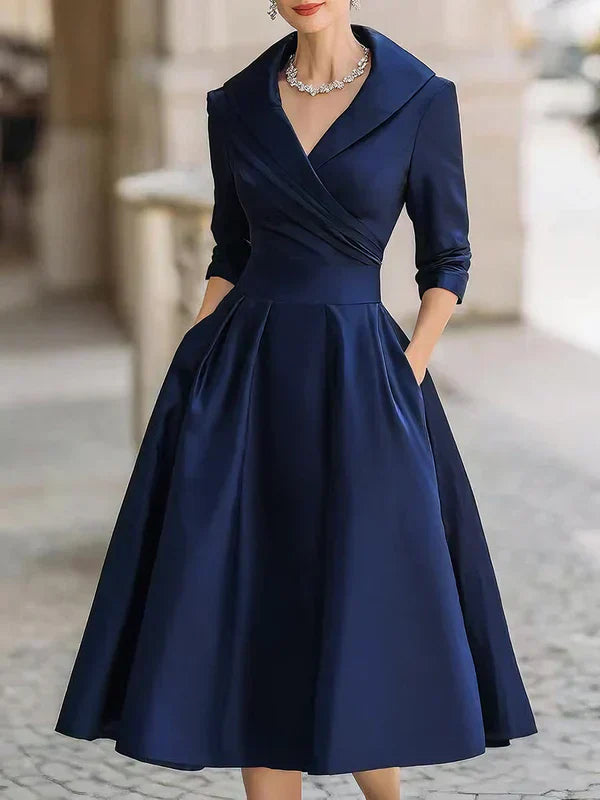 Ursula | Elegantes Kleid mit raffinierten Details und praktischen Taschen